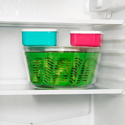 Family-sized salad spinner with ergonomic handle and serving bowl