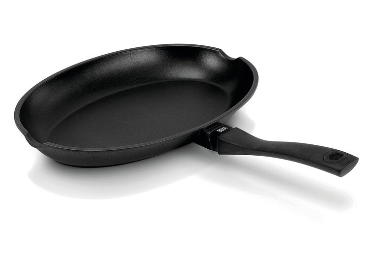 Black frying pan on a white background