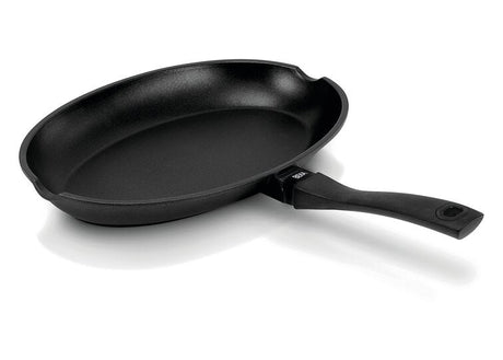 Black frying pan on a white background